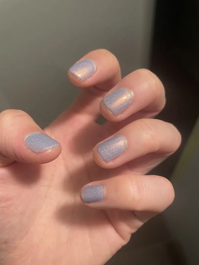 Cirque Colors Hygge nagellack sheer ljusblå kopparskimmer
